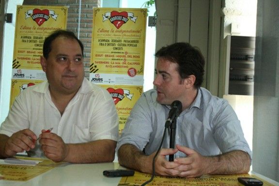 Pere Garriga, alcalde d'arbúcies, i Uriel Bertran, secretari general de Solidaritat, presentant la II Escola d'Estiu
