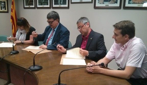 Signatura d'un conveni de comerç entre la Generalitat, l?Ajuntament i la UBIC de Palautordera