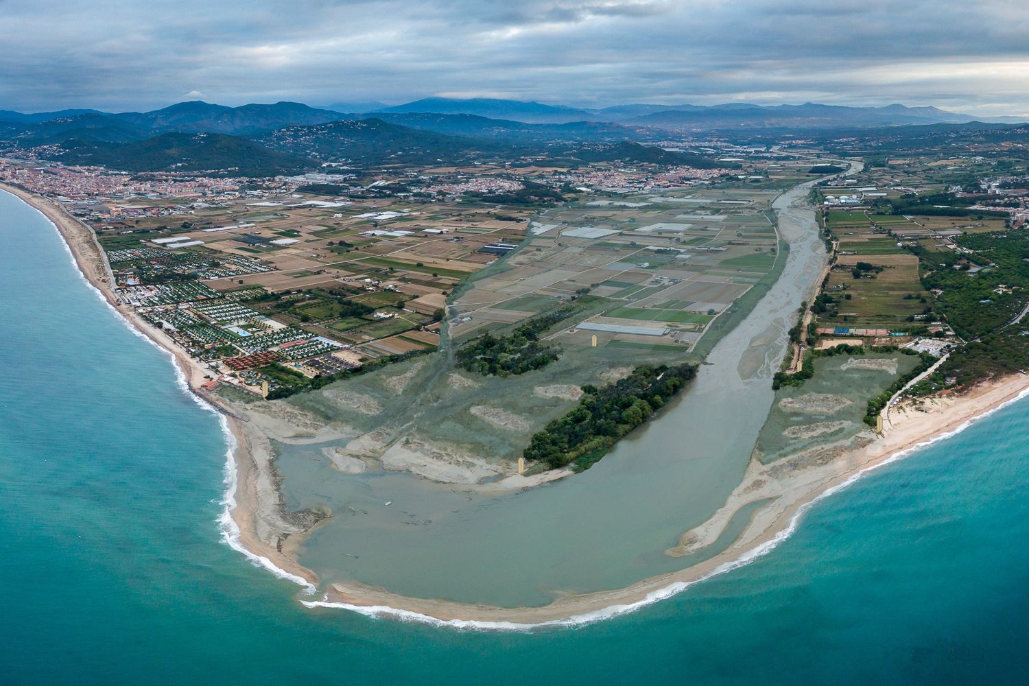 Simulació d'un projecte de restauració de la desembocadura de la Tordera sense els càmpings en zones inundables