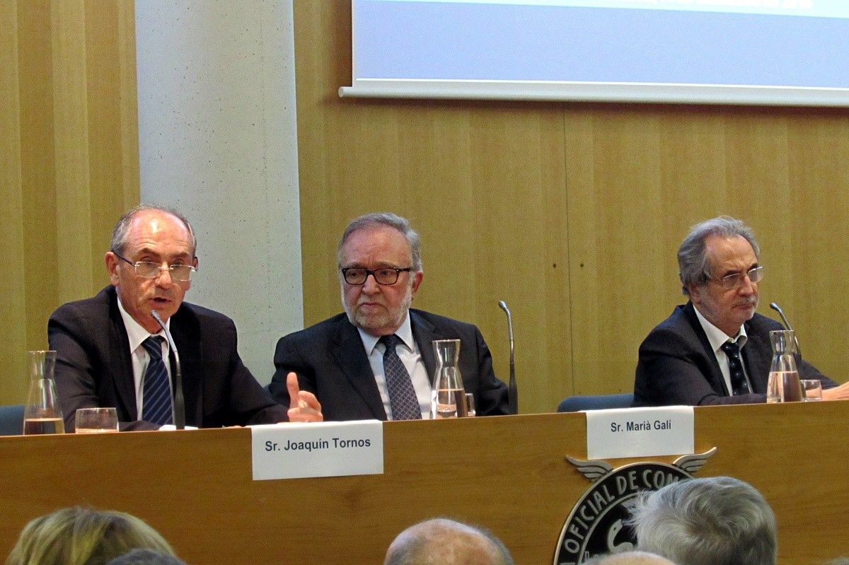 Joaquín Tornos i Joan Perdigó, a la conferència presidida per Marià Galí, president de Mina