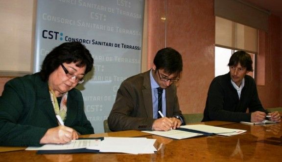Pedraza, Riera i Ballbè en l'acte de signatura 