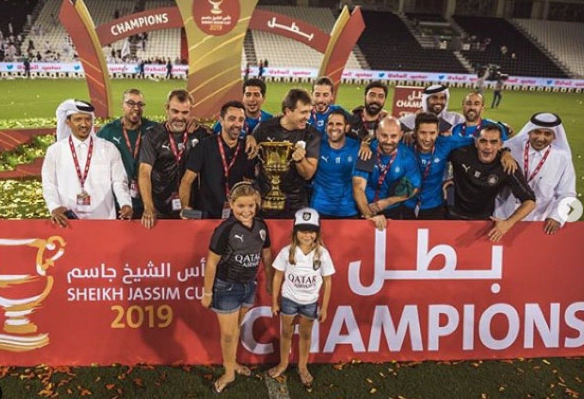 La celebració del primer de títol de Xavi al Qatar