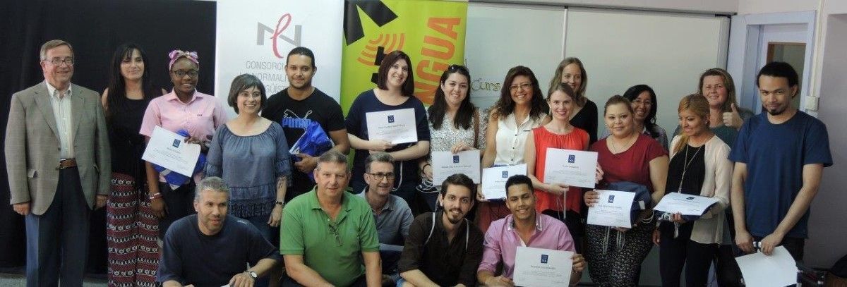Acte de lliurament de diplomes als alumnes que han acabat el 20è i 21è cursos de català per a persones immigrades