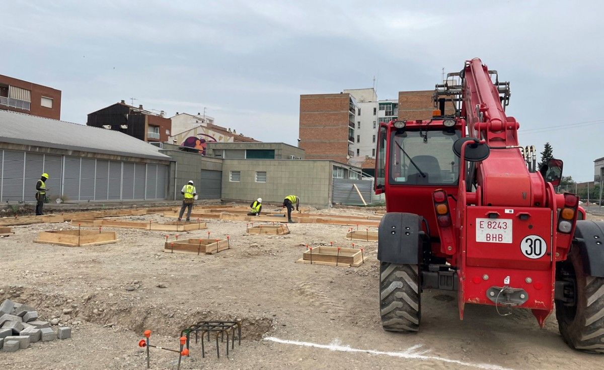 Operaris treballant en l’ampliació