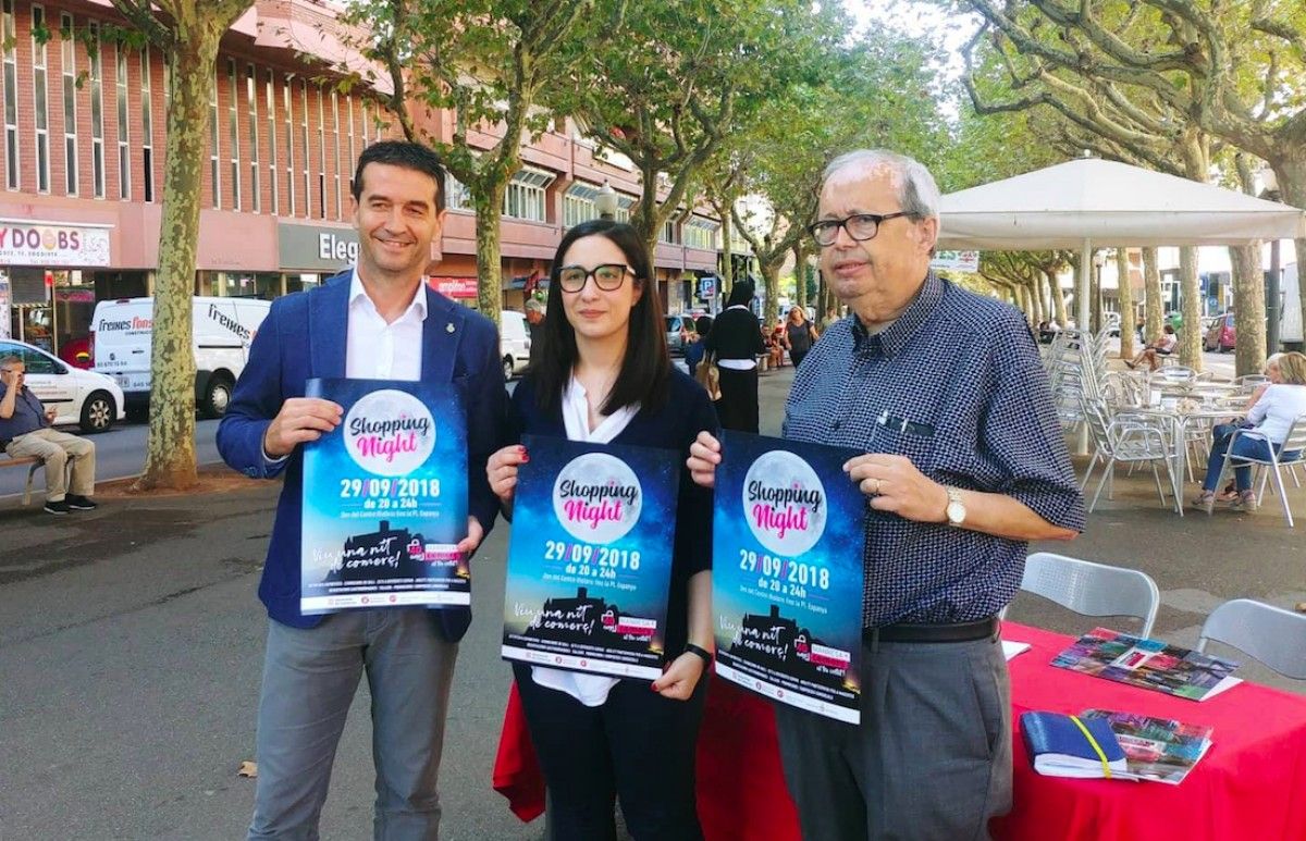Jaume Arnau, Tània Infante i Josep Maria Camps durant la roda de premsa de la setena edició de la Shopping Night de Manresa