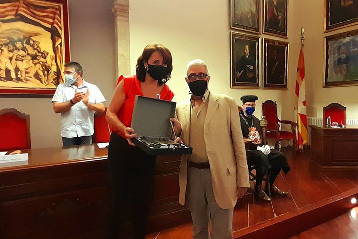 Anna Erra i Pere Puig durant l'acte de la Comissió de Procuradors de Sant Miquel dels Sants