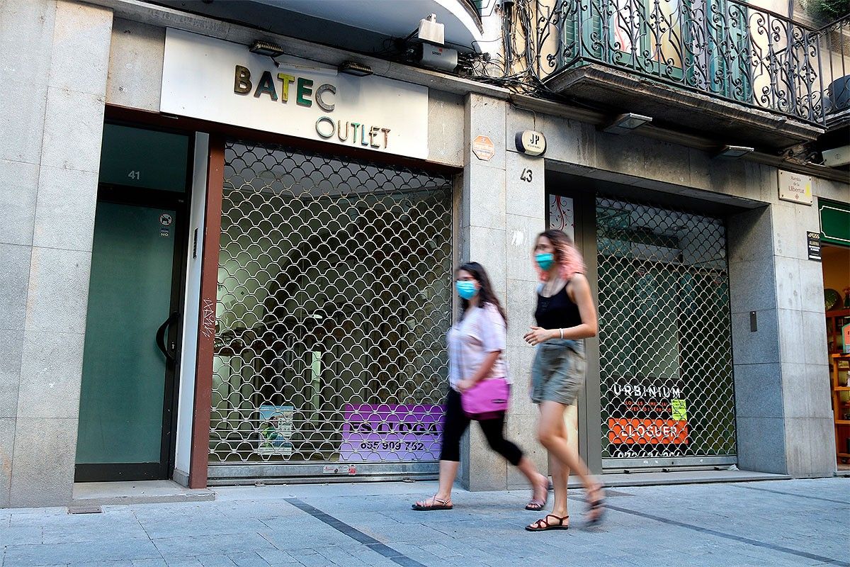 Dos comerços tancats de la Rambla de Girona