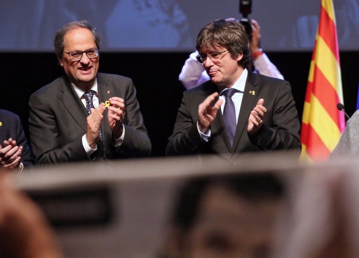 Carles Puigdemont i Quim Torra, en una imatge d'arxiu