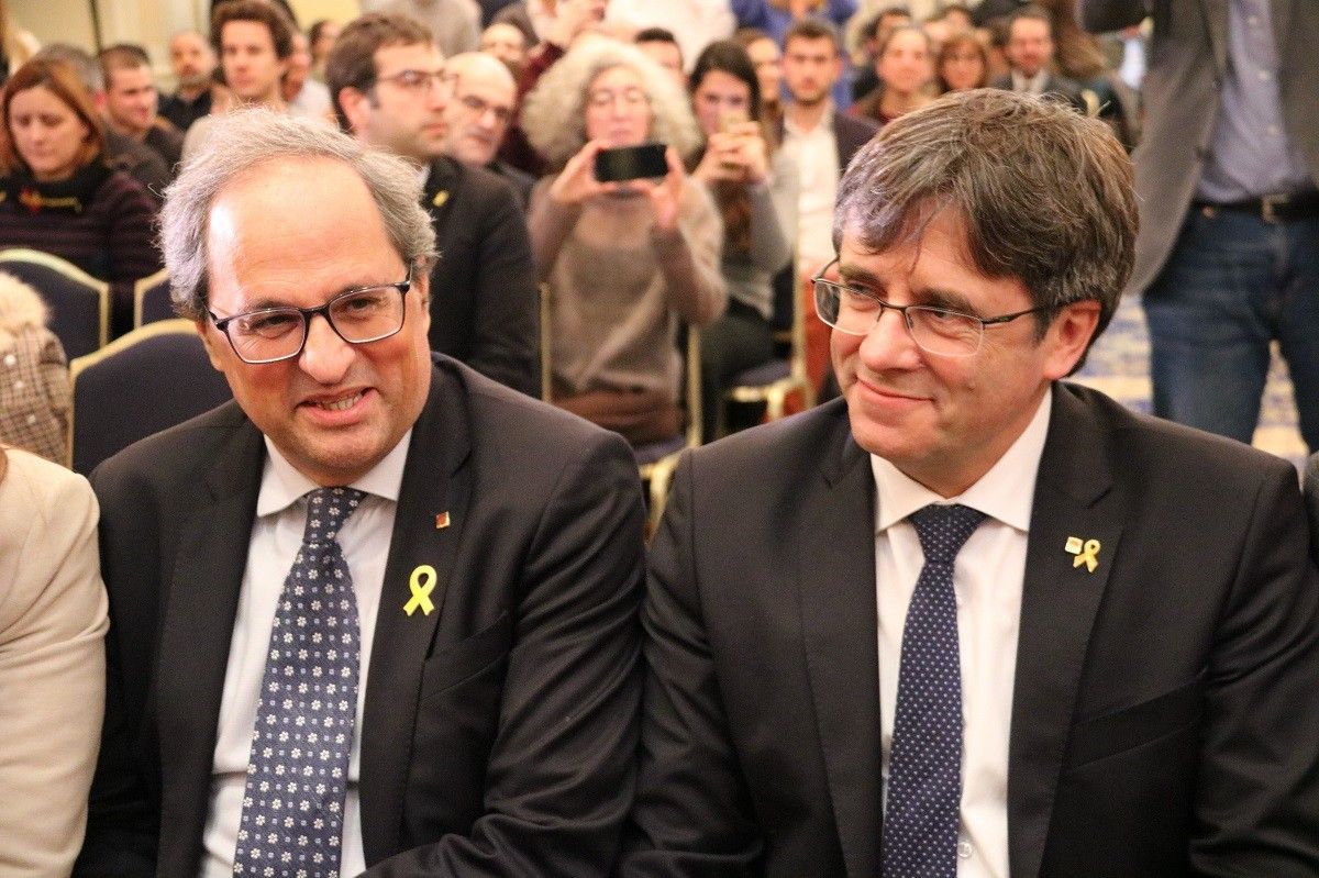 Quim Torra i Carles Puigdemont, a la conferència d'aquest dilluns a Brussel·les