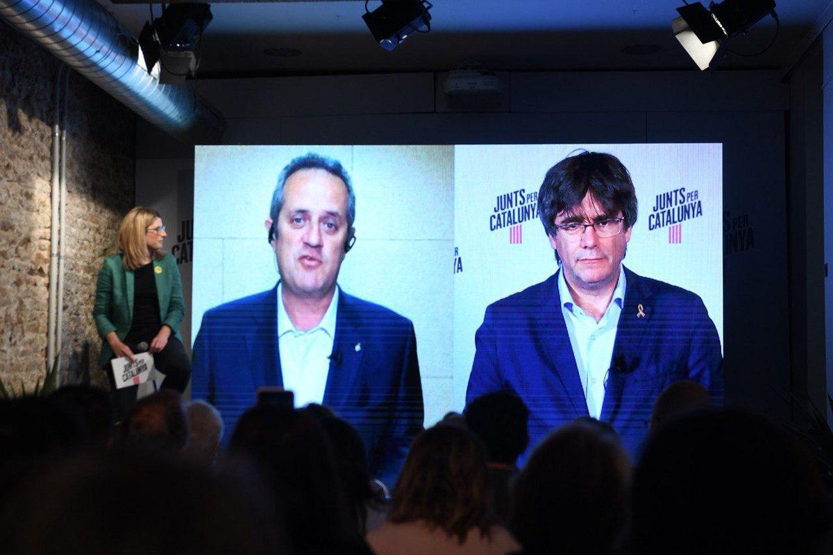Retrobament entre Carles Puigdemont i Quim Forn a la seu de JxCat