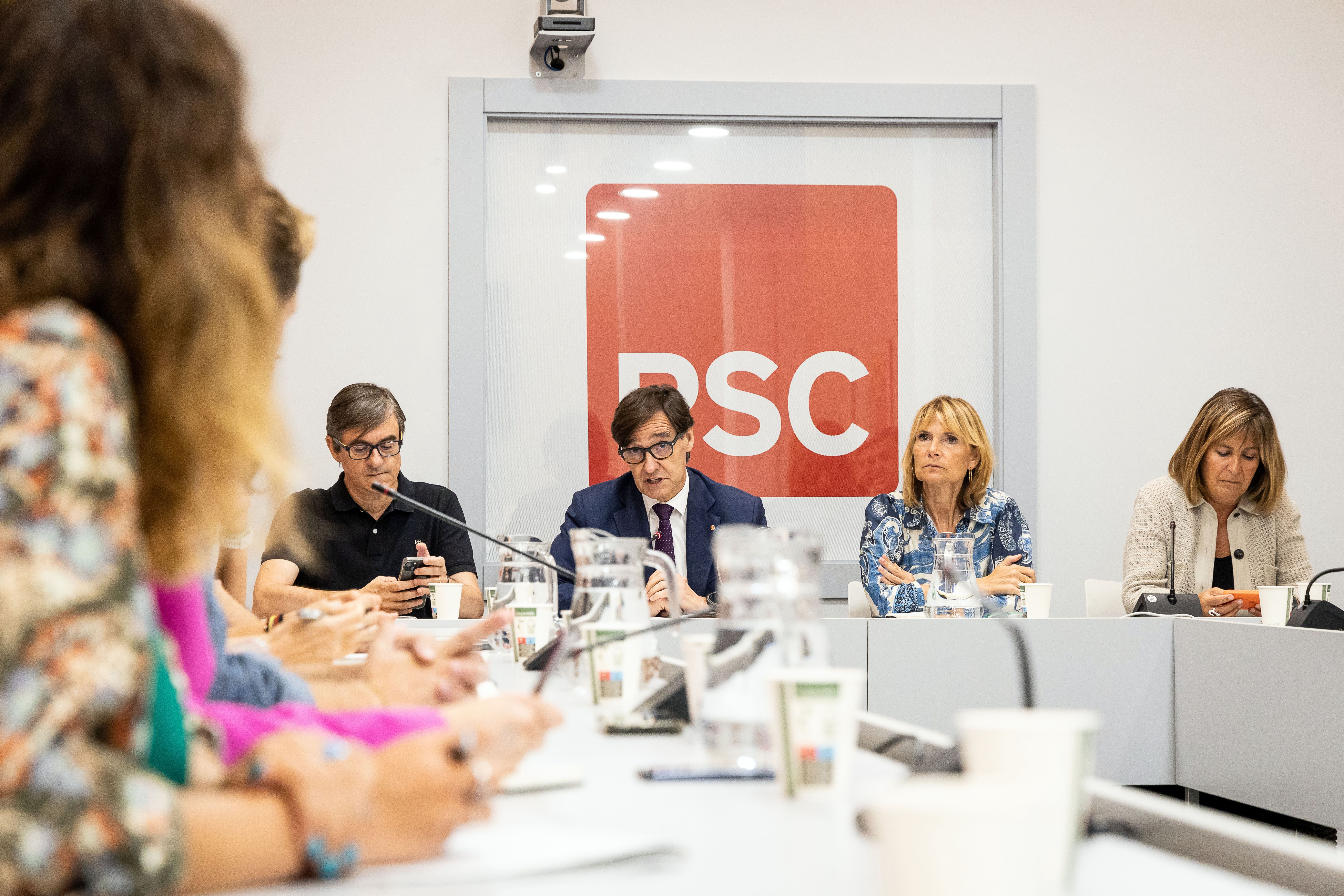 Salvador Illa, Lluïsa Moret i Núria Marín, a la seu del PSC