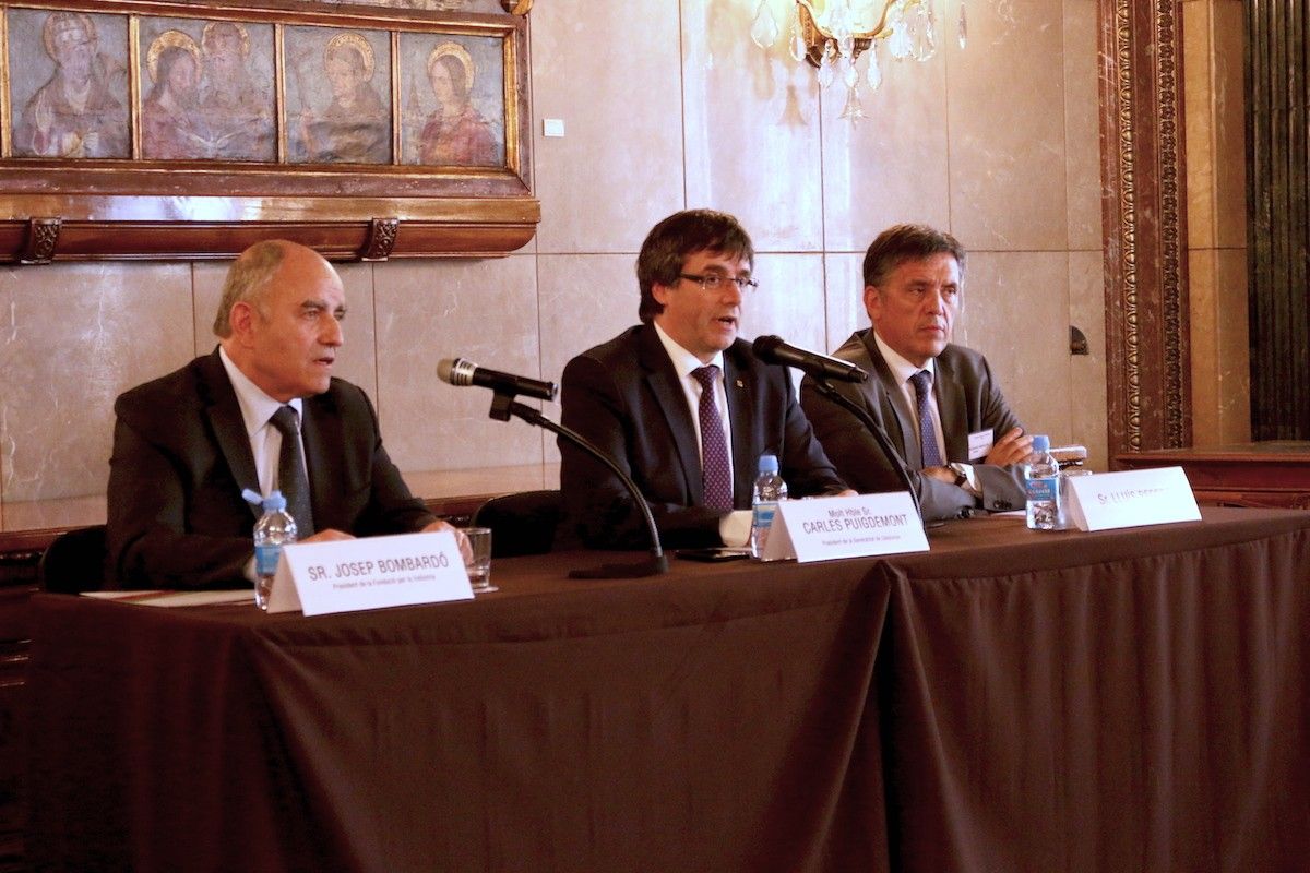 Carles Puigdemont, amb Josep Bombardó i Lluís Recoder