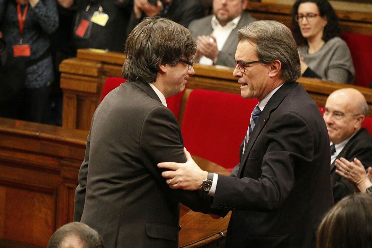 Artur Mas i Carles Puidemont, conversen després de la intervenció del candidat