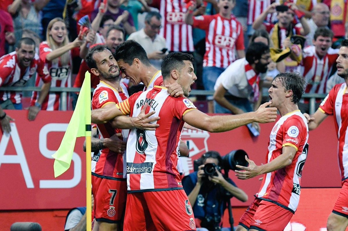 Els jugadors del Girona celebren un gol durant el primer partit de l'equip a Primera