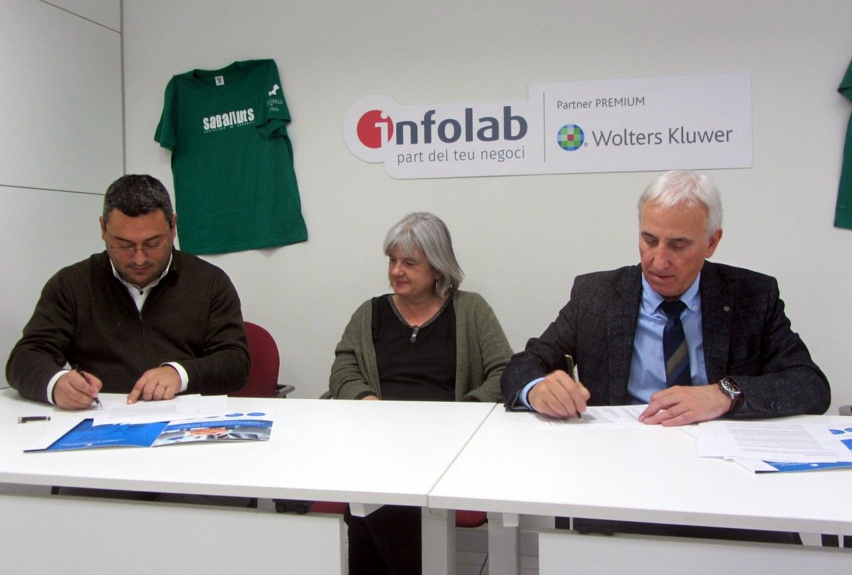 La firma de l'acord entre Saballuts i Infolab
