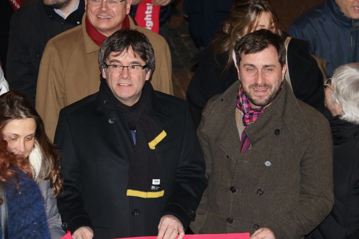 Carles Puigdemont i Toni Comín, en un acte a Lovaina
