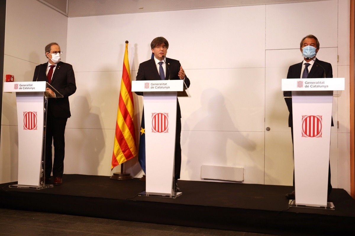 Quim Torra, Carles Puigdemont i Artur Mas, en la compareixença conjunta a Perpinyà